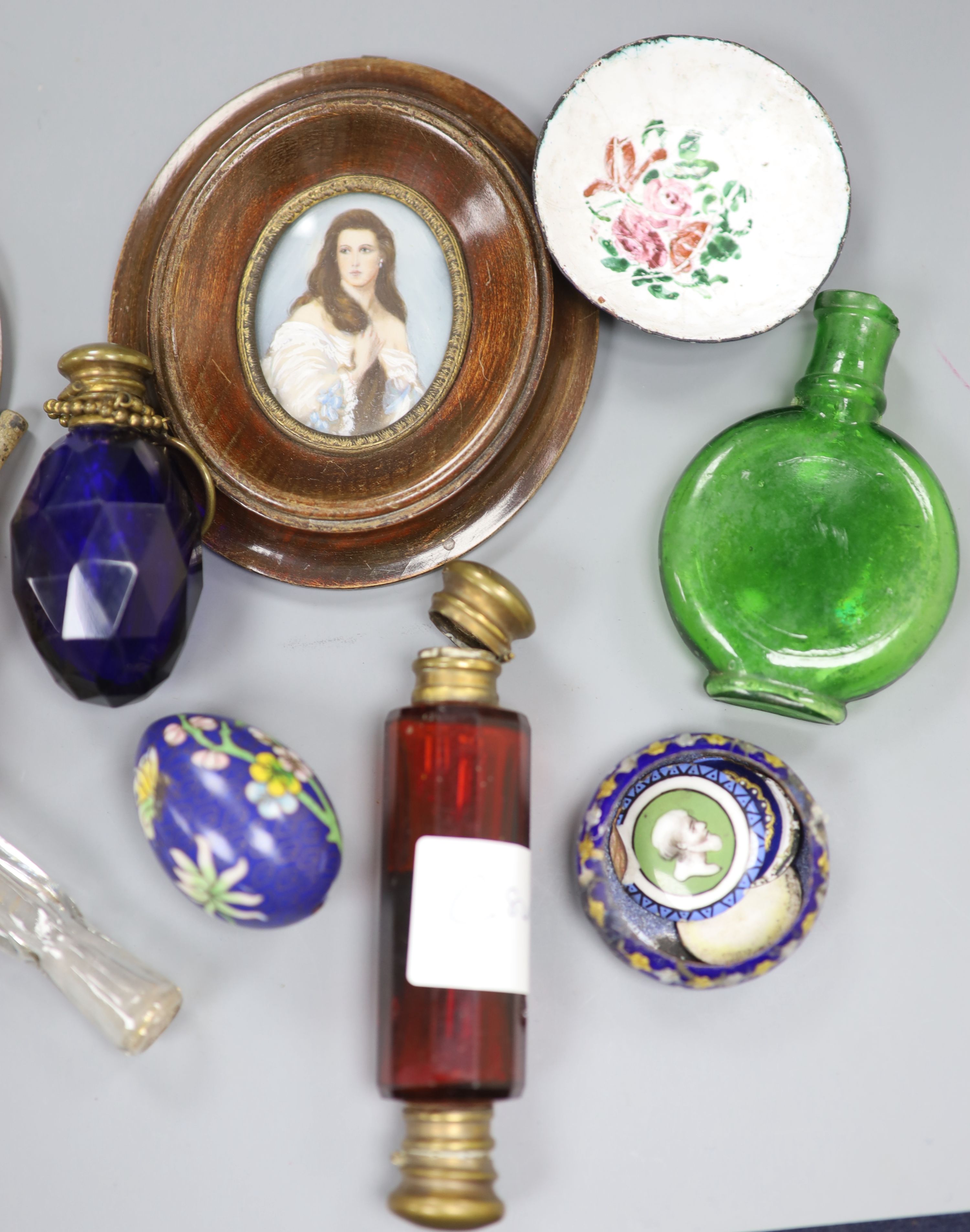 A collection of scent bottles, a miniature antiquity vessel and a miniature of a lady